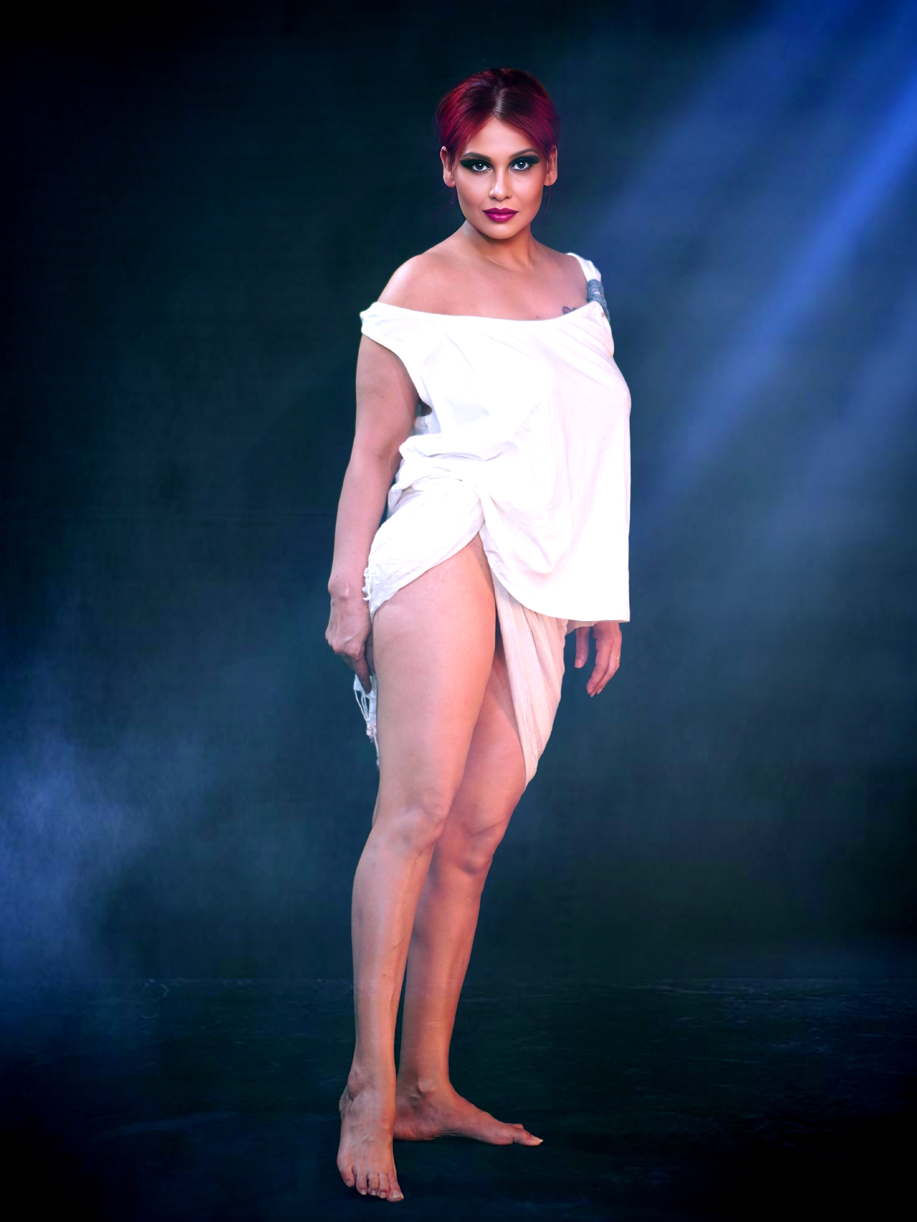 Kanak Raj - Bold White Draped Pose in Studio Light