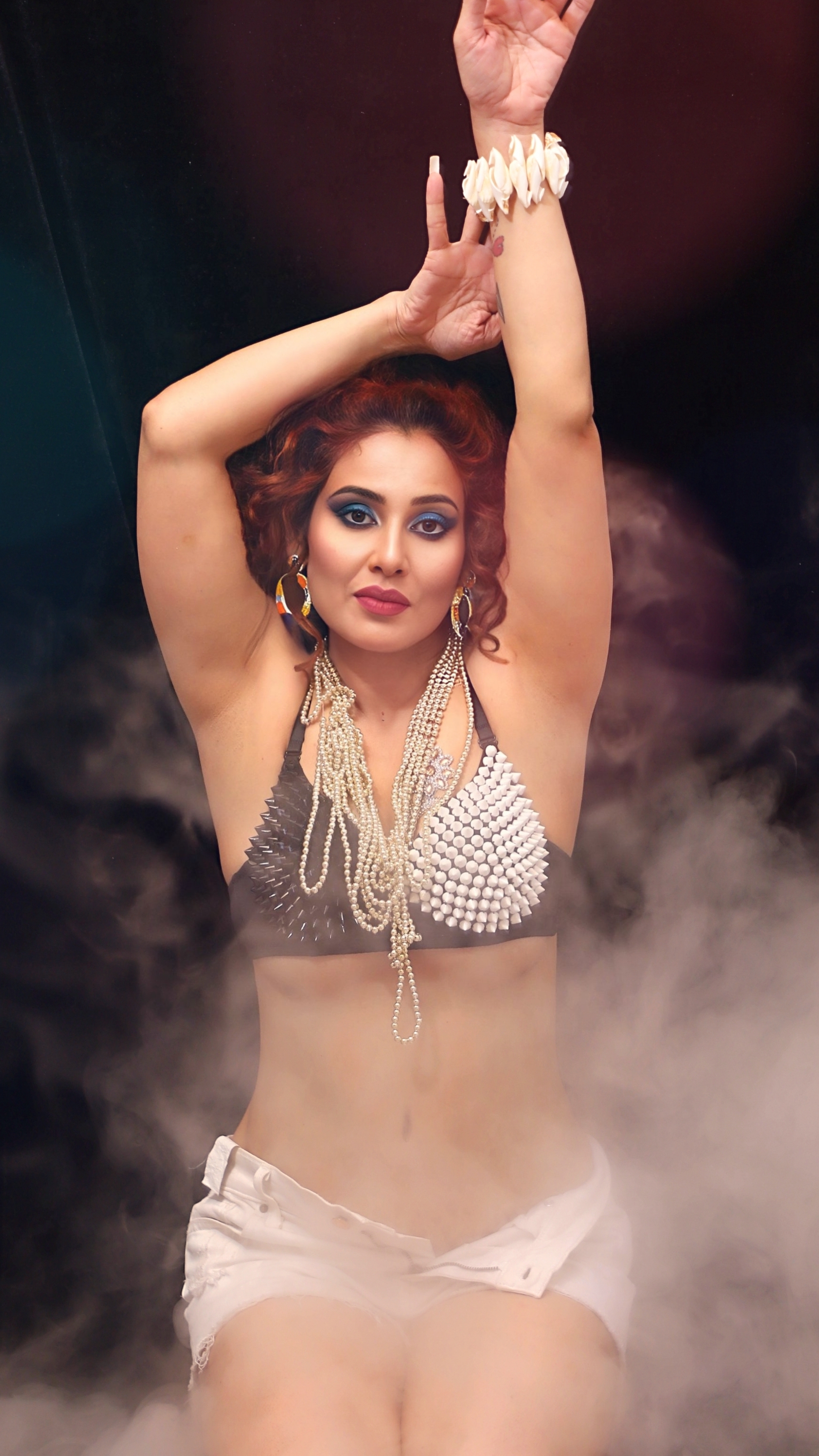 Kanak Raj - Glamorous Pose in Silver Beaded Top and White Skirt