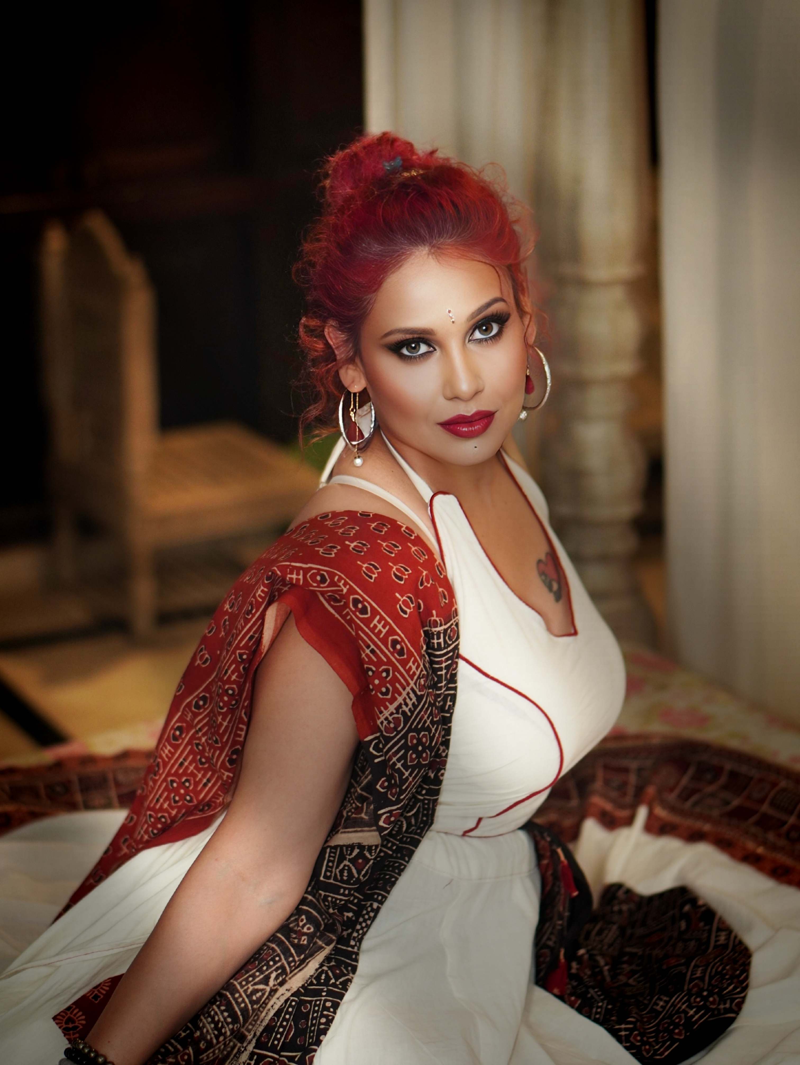 Kanak Raj - Elegant White Dress with Red Accents - Bold Pose