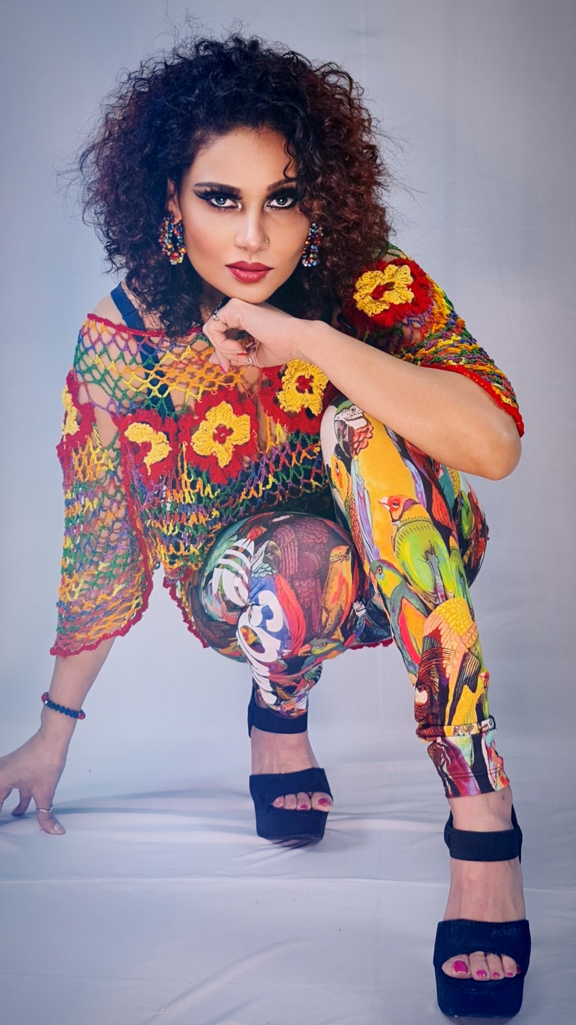 Kanak Raj - Vibrant Crochet Top and Artistic Pose