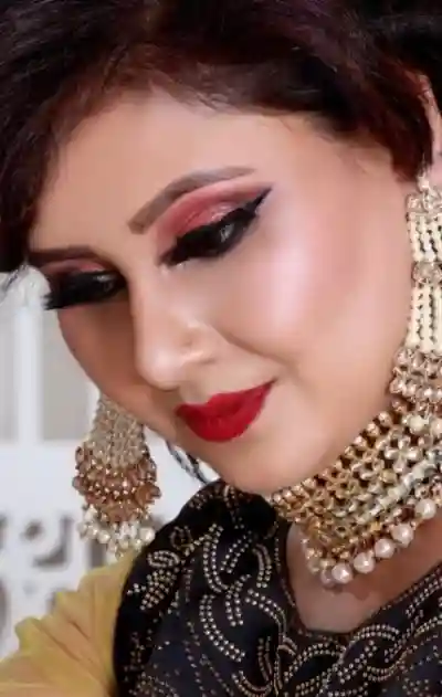 Elegant in Black with Bold Makeup