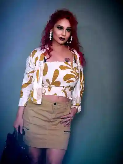 Kanak Raj in Floral Top and Khaki Skirt