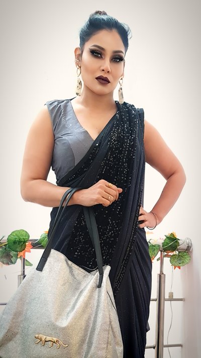 Kanak Raj in Black Sequin Saree Elegance